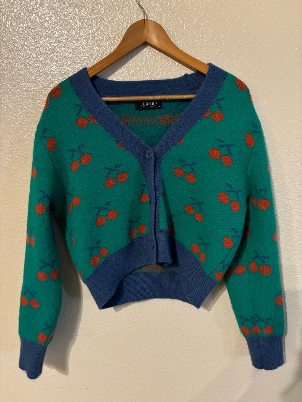 Cider Teal Cherry-Print V-Neck Cropped Cardigan with Blue Trim